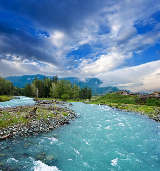 emerald river in a mountains Wall Mural