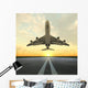 takeoff plane in airport at sunset Wall Mural