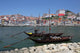 Traditional boats at Douro river in Porto, Portugal Wall Mural
