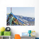 Snowy landscape with prayer flags on a high altitude mountain pass Wall Mural
