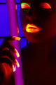 Frau im Schwarzlicht, Woman in blacklight Wall Mural