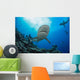 Gray reef sharks and divers Wall Mural