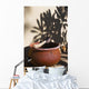 A clay bowl and wooden tool Wall Mural