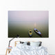 Two wooden boats sit on the tranquil water of the Ganges Wall Mural