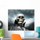 grim reaper. death's skeleton on a cloudy dramatic sky Wall Mural