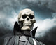 grim reaper. death's skeleton on a cloudy dramatic sky Wall Mural