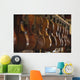 Repaired violins and violas on racks in The Sound Post repair shop Wall Mural