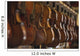 Repaired violins and violas on racks in The Sound Post repair shop Wall Mural