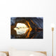 Midnight sun shines through arched iceberg near Lemaire Channel Wall Mural