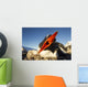 Gentoo Penguin pecks at camera lens while nesting Wall Mural