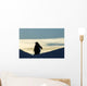 Silhouette of Gentoo Penguin standing at dusk Wall Mural