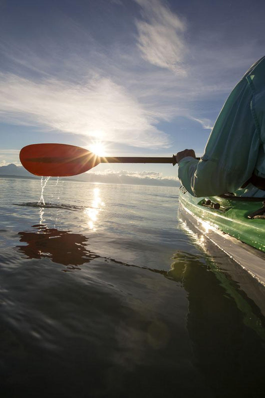 Evening sea kayaking Wall Mural