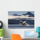 A humpback whale breaches as it leaps Wall Mural