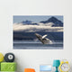 A humpback whale breaches as it leaps Wall Mural