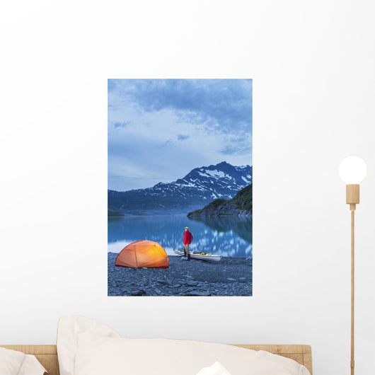 Man camping with a tent and kayak at Shoup Bay State Marine Park Wall Mural