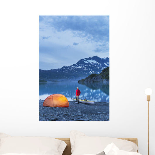 Man camping with a tent and kayak at Shoup Bay State Marine Park Wall Mural