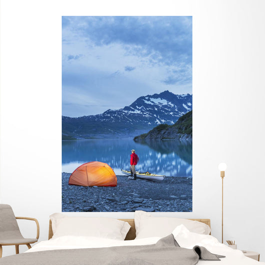 Man camping with a tent and kayak at Shoup Bay State Marine Park Wall Mural