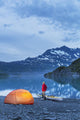 Man camping with a tent and kayak at Shoup Bay State Marine Park Wall Mural