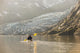 Sea kayakers paddling in evening light at Shoup Bay State Marine Park Wall Mural