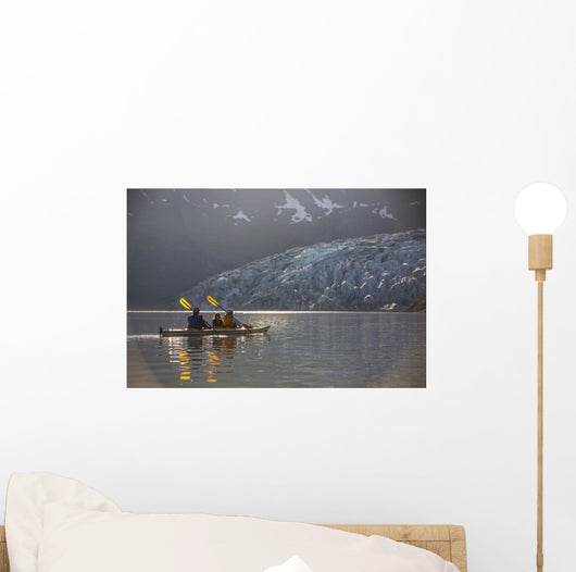 Sea kayakers paddling in evening light at Shoup Bay State Marine Park Wall Mural
