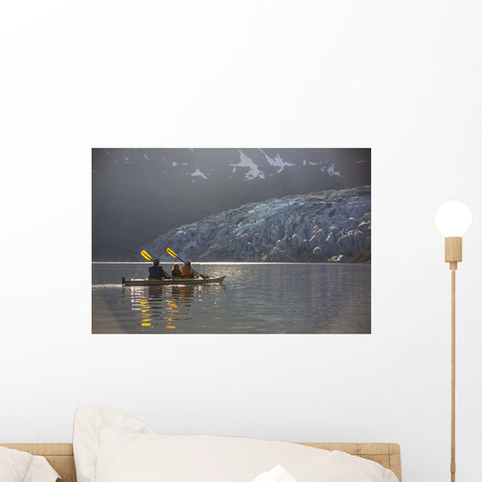 Sea kayakers paddling in evening light at Shoup Bay State Marine Park Wall Mural