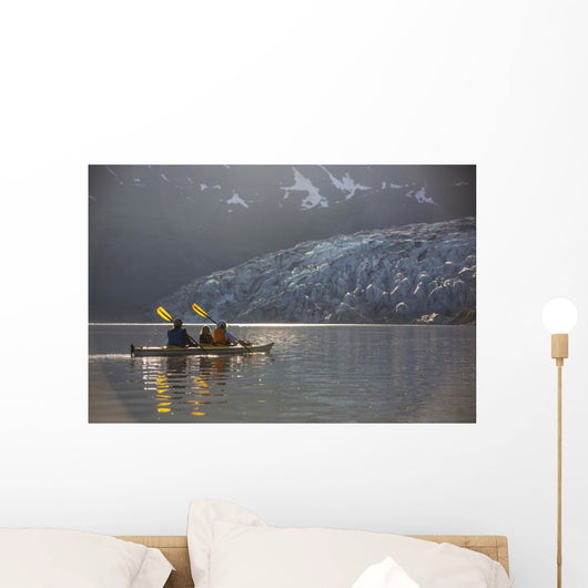 Sea kayakers paddling in evening light at Shoup Bay State Marine Park Wall Mural