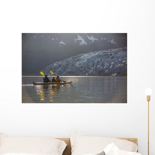 Sea kayakers paddling in evening light at Shoup Bay State Marine Park Wall Mural