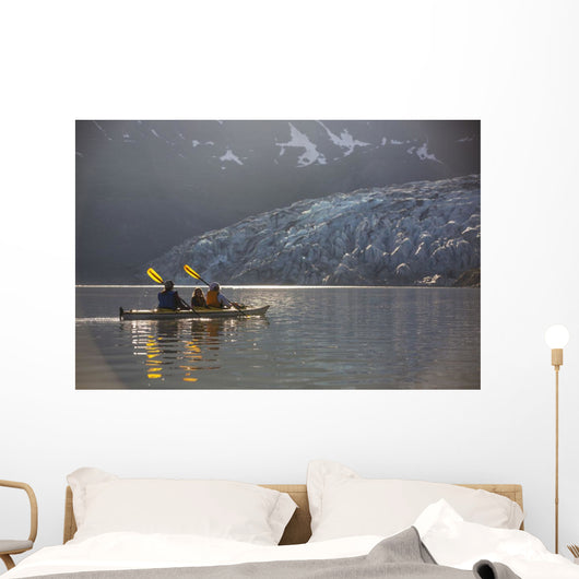 Sea kayakers paddling in evening light at Shoup Bay State Marine Park Wall Mural