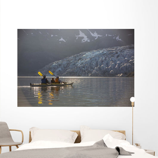 Sea kayakers paddling in evening light at Shoup Bay State Marine Park Wall Mural