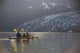 Sea kayakers paddling in evening light at Shoup Bay State Marine Park Wall Mural