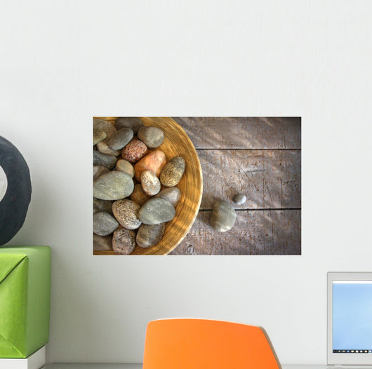 Spa rocks in wooden bowl on rustic wood Wall Mural