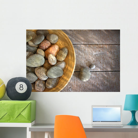 Spa rocks in wooden bowl on rustic wood Wall Mural