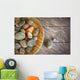 Spa rocks in wooden bowl on rustic wood Wall Mural