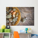 Spa rocks in wooden bowl on rustic wood Wall Mural