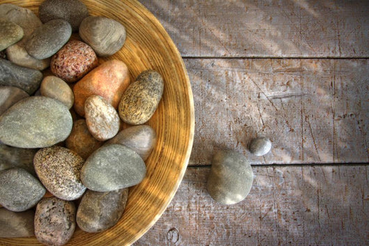 Spa rocks in wooden bowl on rustic wood Wall Mural