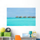 Over-water bungalows at a tropical resort Wall Mural