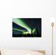 The bright neon green aurora swirling above the boreal forest Wall Mural