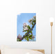 Pink and white crabapple flowers against a blue sky Wall Mural