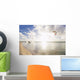 Kiteboarding in tropical lagoon in the South Pacific at sunset Wall Mural