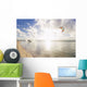 Kiteboarding in tropical lagoon in the South Pacific at sunset Wall Mural