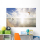 Kiteboarding in tropical lagoon in the South Pacific at sunset Wall Mural