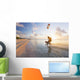 Kiteboarding in tropical lagoon in the South Pacific at sunset Wall Mural