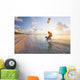 Kiteboarding in tropical lagoon in the South Pacific at sunset Wall Mural