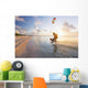 Kiteboarding in tropical lagoon in the South Pacific at sunset Wall Mural