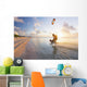 Kiteboarding in tropical lagoon in the South Pacific at sunset Wall Mural