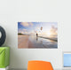Kiteboarding in tropical lagoon in the South Pacific at sunset Wall Mural