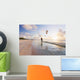 Kiteboarding in tropical lagoon in the South Pacific at sunset Wall Mural