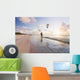 Kiteboarding in tropical lagoon in the South Pacific at sunset Wall Mural