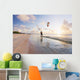 Kiteboarding in tropical lagoon in the South Pacific at sunset Wall Mural