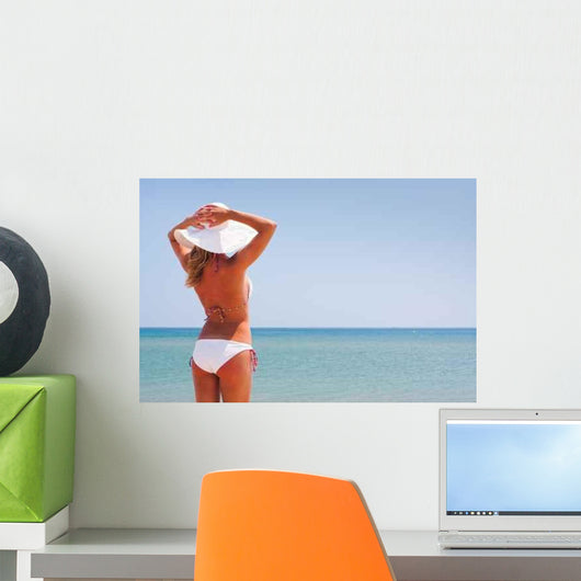 Young Woman Enjoying Sea Wall Decal